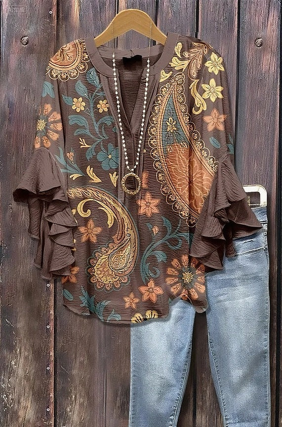 Florina™ - Blus med Blommönster, Volangärmar och Feminint Snitt